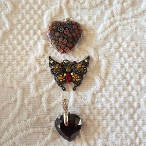 Three necklace pendants